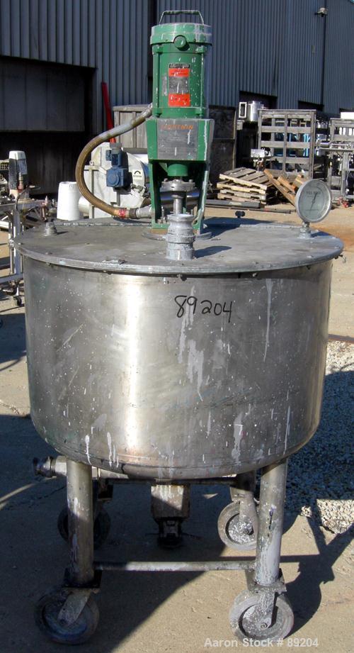 USED: Graco tank, 100 gallon, 304 stainless steel, vertical. 30" diameter x 20" straight side. Flat bolt on top with 1/4 hinged cover, dish bottom. Top entering Lightnin agitator, model XJCK-43. 1" d...