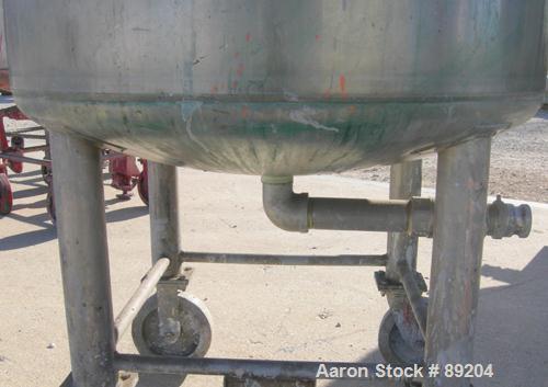 USED: Graco tank, 100 gallon, 304 stainless steel, vertical. 30" diameter x 20" straight side. Flat bolt on top with 1/4 hinged cover, dish bottom. Top entering Lightnin agitator, model XJCK-43. 1" d...