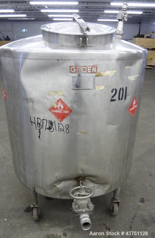 Used Groen Tank, 200 Gallons, 304 Stainless Steel, Vertical. 42" Diameter x 35" straight side. Dished top, 1" sloped bottom.Openings top 16" manway with cover; approximate 2-1/2" side bottom outlet.M...