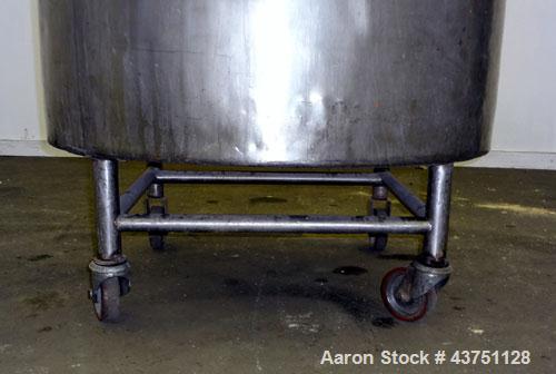 Used Groen Tank, 200 Gallons, 304 Stainless Steel, Vertical. 42" Diameter x 35" straight side. Dished top, 1" sloped bottom.Openings top 16" manway with cover; approximate 2-1/2" side bottom outlet.M...