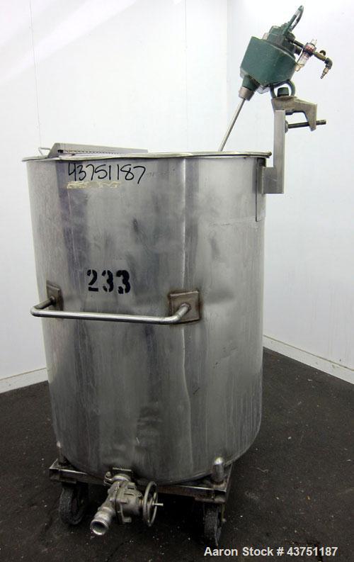 Used Groen Tank, 200 Gallon, 304 Stainless Steel, Vertical.  38" Diameter x 47" straight side.  Bolt-on hinged top cover, 1" sloped bottom.  Clamp-on Lightnin air operated agitator, model NAG-33.  3/...