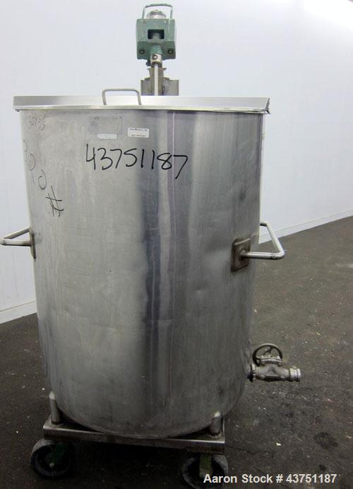 Used Groen Tank, 200 Gallon, 304 Stainless Steel, Vertical.  38" Diameter x 47" straight side.  Bolt-on hinged top cover, 1" sloped bottom.  Clamp-on Lightnin air operated agitator, model NAG-33.  3/...