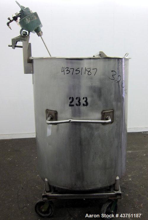 Used Groen Tank, 200 Gallon, 304 Stainless Steel, Vertical.  38" Diameter x 47" straight side.  Bolt-on hinged top cover, 1" sloped bottom.  Clamp-on Lightnin air operated agitator, model NAG-33.  3/...