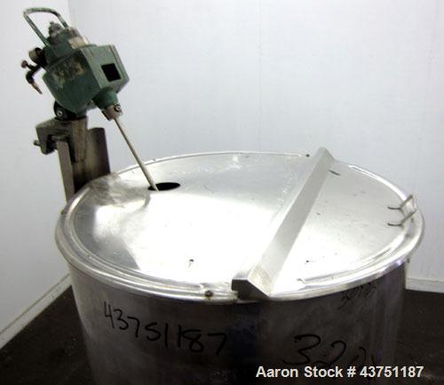 Used Groen Tank, 200 Gallon, 304 Stainless Steel, Vertical.  38" Diameter x 47" straight side.  Bolt-on hinged top cover, 1" sloped bottom.  Clamp-on Lightnin air operated agitator, model NAG-33.  3/...