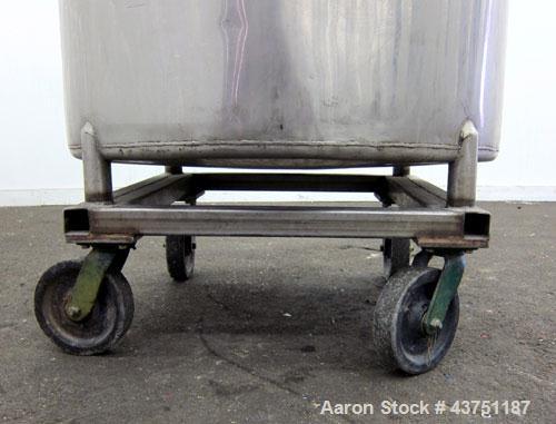 Used Groen Tank, 200 Gallon, 304 Stainless Steel, Vertical.  38" Diameter x 47" straight side.  Bolt-on hinged top cover, 1" sloped bottom.  Clamp-on Lightnin air operated agitator, model NAG-33.  3/...