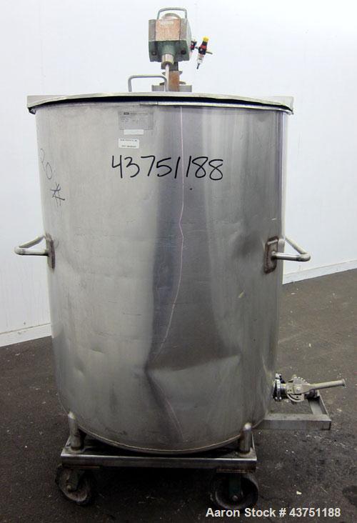 Used Groen Tank, 200 Gallon, 304 Stainless Steel, Vertical.  38" Diameter x 47" straight side.  Bolt-on hinged top cover, 1" sloped bottom.  Clamp-on Lightnin air operated agitator, model NAG-33.  3/...