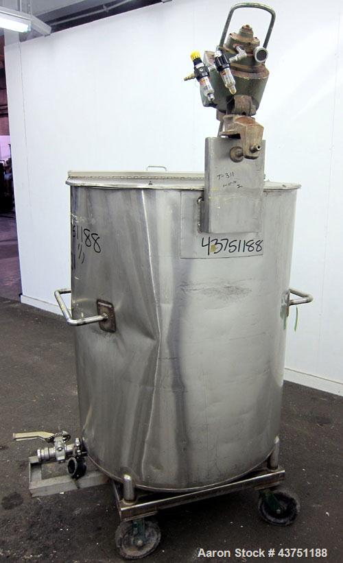 Used Groen Tank, 200 Gallon, 304 Stainless Steel, Vertical.  38" Diameter x 47" straight side.  Bolt-on hinged top cover, 1" sloped bottom.  Clamp-on Lightnin air operated agitator, model NAG-33.  3/...