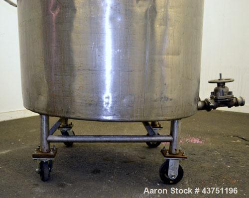 Used Groen Tank, 200 Gallon, 304 Stainless Steel, Vertical.42" Diameter x 35" straight side.Dished top, 1" sloped bottom.Openings:top 16" manway with cover; approximately 2-1/2" side bottom outlet.Mo...