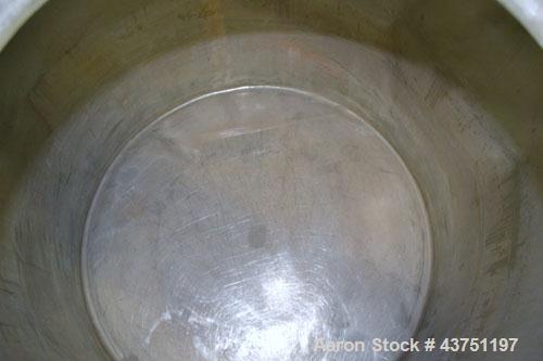 Used Groen Tank, 200 Gallon, 304 Stainless Steel, Vertical.  42" Diameter x 35" straight side.  Dished top, 1" sloped bottom.  Openings: top 16" manway with cover; approximately 2-1/2" side bottom ou...