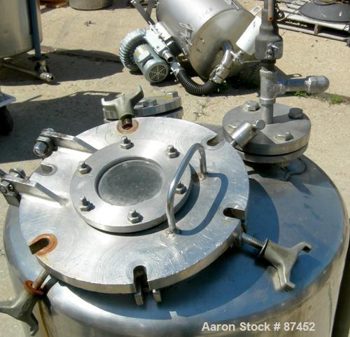Used Groen Pressure Tank, 60 Gallon, 316 Stainless Steel, Vertical. 24" Diameter x 34" straight side, dish top and bottom. Internal rated 25 psi at 650 deg F. Openings: top (2) 2", 10" with a 4" sigh...