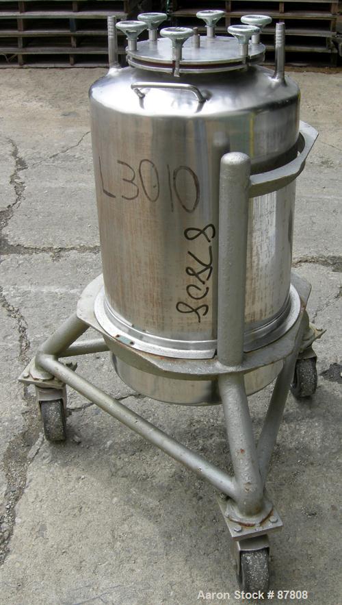 Used Groen Tank, 18 Gallon, 316 Stainless Steel, Vertical. 15-1/2" Diameter x 23" straight side, dish top and bottom. Openings: top (2) 3/8", 6" with cover; 3/8" center bottom outlet. Includes a carb...