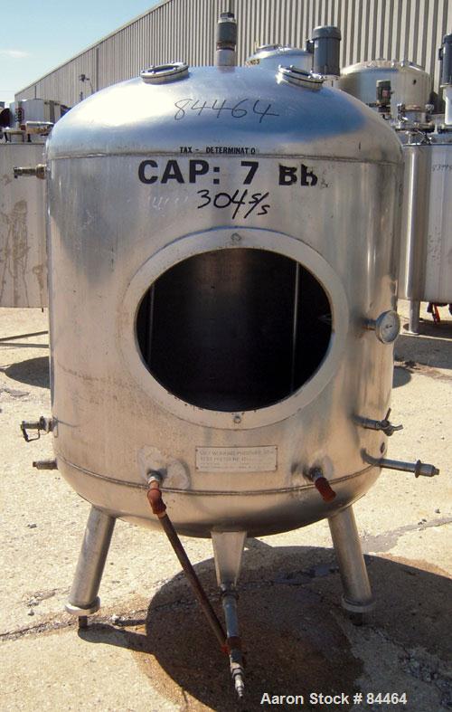 Used Grundy Pressure Tank, 182 gallon, 304 stainless steel, vertical. 38" diameter x 30" straight side, dished top and bottom, rated 30 psi. Openings: top 1-1/2", (2) 3" sight glass; side (3) 1", 14"...