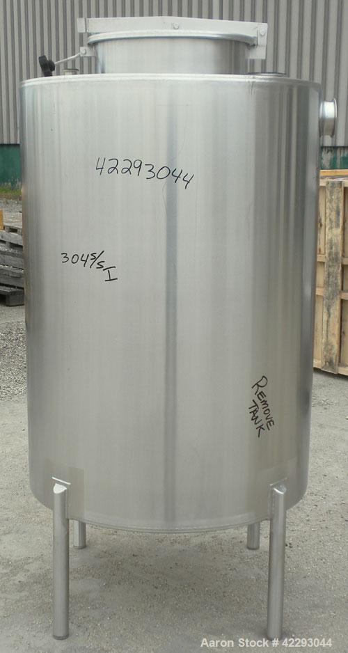 Used Hartel Tank, 200 Gallon, 304 Stainless Steel, Vertical. 36" Diameter x 48" straight side. Flat top and bottom. Openings: top 1-1/2" tri-clamp, 2" tri-clamp, 3" tri-clamp, 6" tri-clamp, 16" manwa...