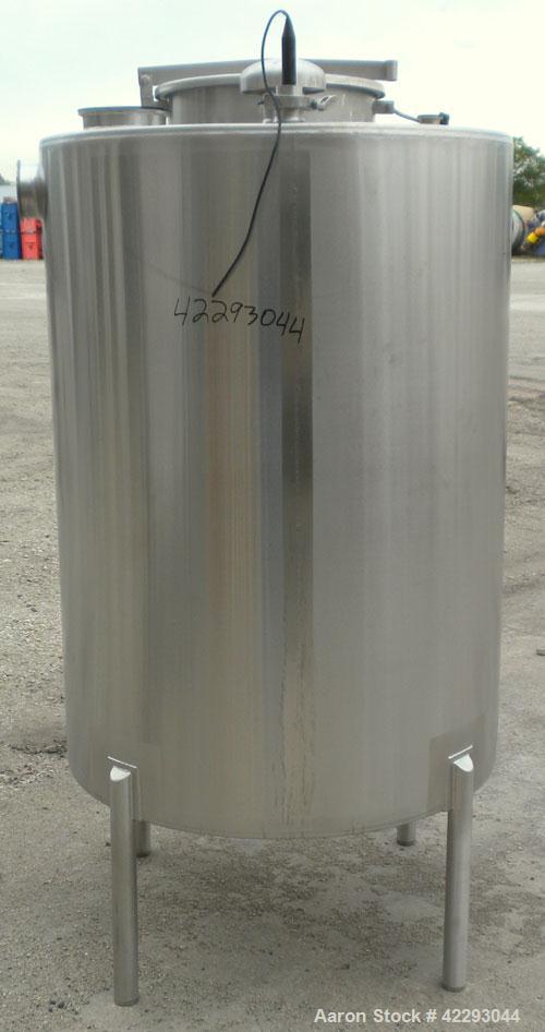 Used Hartel Tank, 200 Gallon, 304 Stainless Steel, Vertical. 36" Diameter x 48" straight side. Flat top and bottom. Openings: top 1-1/2" tri-clamp, 2" tri-clamp, 3" tri-clamp, 6" tri-clamp, 16" manwa...