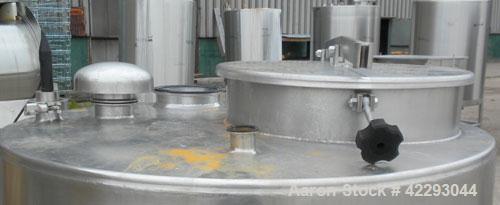 Used Hartel Tank, 200 Gallon, 304 Stainless Steel, Vertical. 36" Diameter x 48" straight side. Flat top and bottom. Openings: top 1-1/2" tri-clamp, 2" tri-clamp, 3" tri-clamp, 6" tri-clamp, 16" manwa...