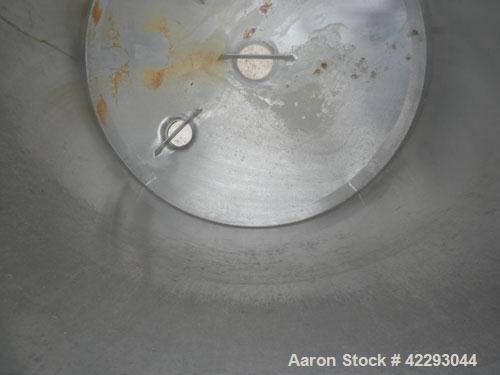 Used Hartel Tank, 200 Gallon, 304 Stainless Steel, Vertical. 36" Diameter x 48" straight side. Flat top and bottom. Openings: top 1-1/2" tri-clamp, 2" tri-clamp, 3" tri-clamp, 6" tri-clamp, 16" manwa...