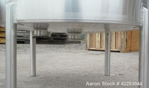 Used Hartel Tank, 200 Gallon, 304 Stainless Steel, Vertical. 36" Diameter x 48" straight side. Flat top and bottom. Openings: top 1-1/2" tri-clamp, 2" tri-clamp, 3" tri-clamp, 6" tri-clamp, 16" manwa...