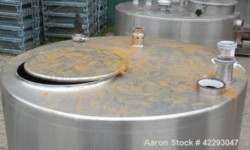Used Hartel Tank, 400 Gallon, 304 Stainless Steel, Vertical. 45" Diameter x 60" straight side. Flat top and bottom. Openings: top (2) 2" tri-clamp, (2) 3-1/2" threaded, 4" tri-clamp, 18" manway with ...