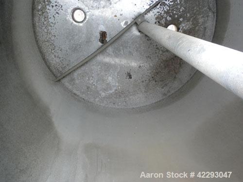 Used Hartel Tank, 400 Gallon, 304 Stainless Steel, Vertical. 45" Diameter x 60" straight side. Flat top and bottom. Openings: top (2) 2" tri-clamp, (2) 3-1/2" threaded, 4" tri-clamp, 18" manway with ...