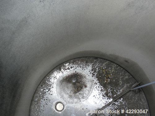 Used Hartel Tank, 400 Gallon, 304 Stainless Steel, Vertical. 45" Diameter x 60" straight side. Flat top and bottom. Openings: top (2) 2" tri-clamp, (2) 3-1/2" threaded, 4" tri-clamp, 18" manway with ...