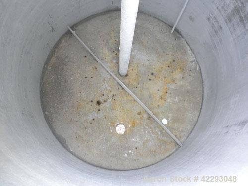 Used Hartel Tank, 400 Gallon, 304 Stainless Steel, Vertical. 45'' Diameter x 60'' straight side. Flat top and bottom. Openings: top 1-1/2'' tri-clamp, 2'' tri-clamp, (2) 3-1/2'' threaded, (2) 3/4'' N...