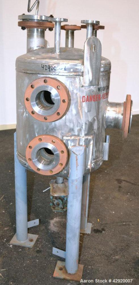 Used Industrial Alloy Fab Pressure Tank, 45 Gallon, 304L Stainless Steel, Vertical. 24 Diameter x 22 straight side, dished top and bottom. Internal rated 35 psi at 400 degrees F. Openings top (2) 1, ...