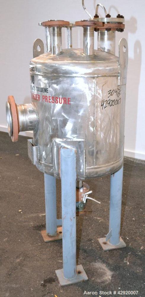 Used Industrial Alloy Fab Pressure Tank, 45 Gallon, 304L Stainless Steel, Vertical. 24 Diameter x 22 straight side, dished top and bottom. Internal rated 35 psi at 400 degrees F. Openings top (2) 1, ...
