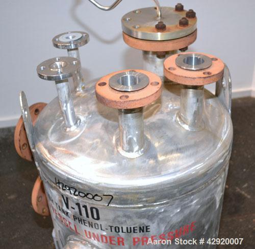 Used Industrial Alloy Fab Pressure Tank, 45 Gallon, 304L Stainless Steel, Vertical. 24 Diameter x 22 straight side, dished top and bottom. Internal rated 35 psi at 400 degrees F. Openings top (2) 1, ...