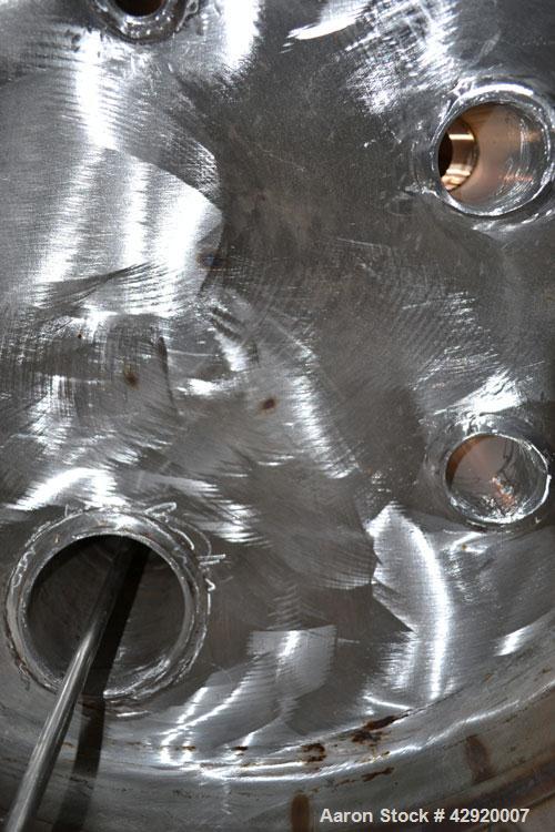Used Industrial Alloy Fab Pressure Tank, 45 Gallon, 304L Stainless Steel, Vertical. 24 Diameter x 22 straight side, dished top and bottom. Internal rated 35 psi at 400 degrees F. Openings top (2) 1, ...