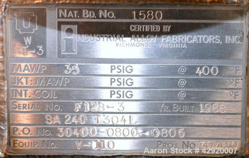 Used Industrial Alloy Fab Pressure Tank, 45 Gallon, 304L Stainless Steel, Vertical. 24 Diameter x 22 straight side, dished top and bottom. Internal rated 35 psi at 400 degrees F. Openings top (2) 1, ...
