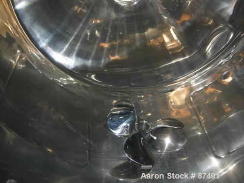 USED: Lee tank, 40 gallon, 304 stainless steel, vertical. 24" diameter x 20" straight side x 20" cone. Dish bolt on top. Off center Lightnin agitator, model V5C18N. 1" diameter 2 piece shaft with a 3...