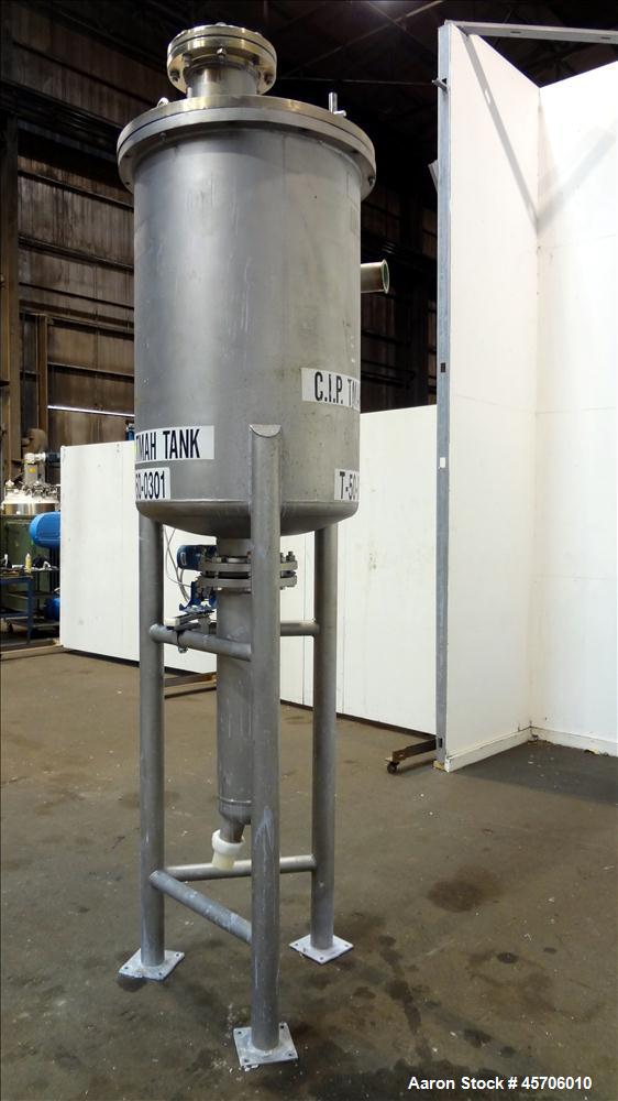 Used Lee Industries Teflon Lined Pressure Tank, 144 Gallon, Model 144DBT, 316 Stainless Steel, Vertical. 30" Diameter x 44" straight side, dished bolt top, dished bottom. Internal rated Full Vacuum/1...