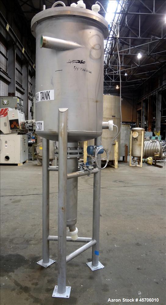 Used Lee Industries Teflon Lined Pressure Tank, 144 Gallon, Model 144DBT, 316 Stainless Steel, Vertical. 30" Diameter x 44" straight side, dished bolt top, dished bottom. Internal rated Full Vacuum/1...