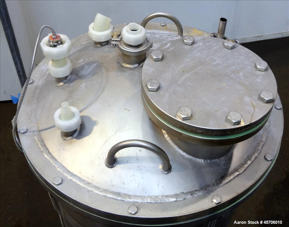 Used Lee Industries Teflon Lined Pressure Tank, 144 Gallon, Model 144DBT, 316 Stainless Steel, Vertical. 30" Diameter x 44" straight side, dished bolt top, dished bottom. Internal rated Full Vacuum/1...