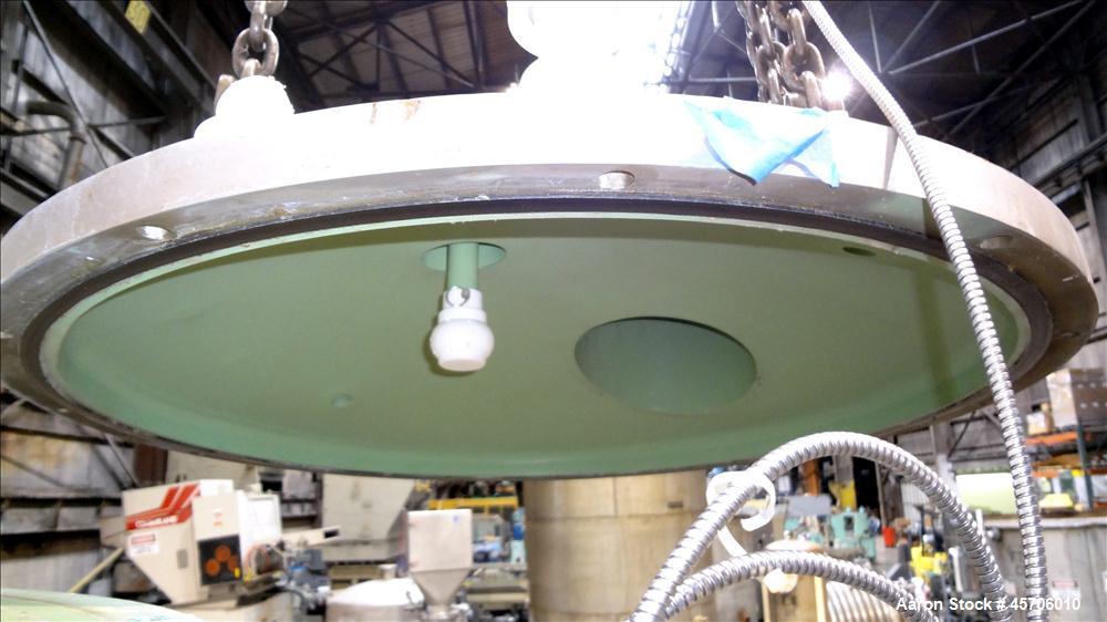 Used Lee Industries Teflon Lined Pressure Tank, 144 Gallon, Model 144DBT, 316 Stainless Steel, Vertical. 30" Diameter x 44" straight side, dished bolt top, dished bottom. Internal rated Full Vacuum/1...