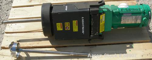 USED: Lee tank, 25 gallon, 304 stainless steel, vertical. 18" diameter x 22" straight side x 12" cone. Dish bolt on top. Off center Lightnin agitator, model V5C18N. 1" diameter 2 piece shaft with a 3...