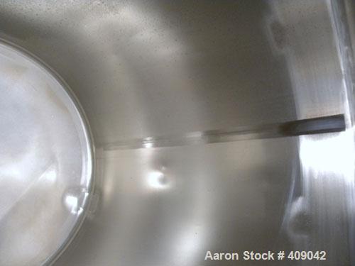 Used Lee Industries Tank, Model 300DBT, 300 Gallon, 316 Stainless Steel, Vertical. 44" diameter x 48" straight side, dished top and bottom. Internal rated to –20 deg.f.. Openings top 3/8’’, (2) 1-1/2...