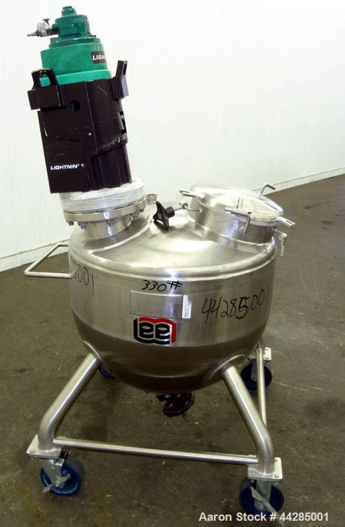 Used Lee Industries Tank,  50 Gallon, Model 50A, 316 Stainless Steel, Vertical. Approximate 30” diameter x 27” deep. Dished top, hemispherical bottom. Off center Lightning Vektor air operated agitato...