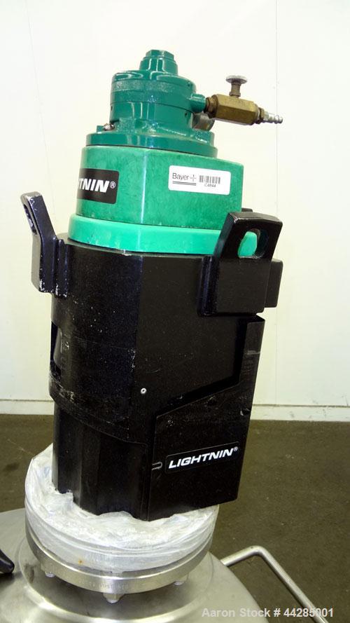 Used Lee Industries Tank,  50 Gallon, Model 50A, 316 Stainless Steel, Vertical. Approximate 30” diameter x 27” deep. Dished top, hemispherical bottom. Off center Lightning Vektor air operated agitato...