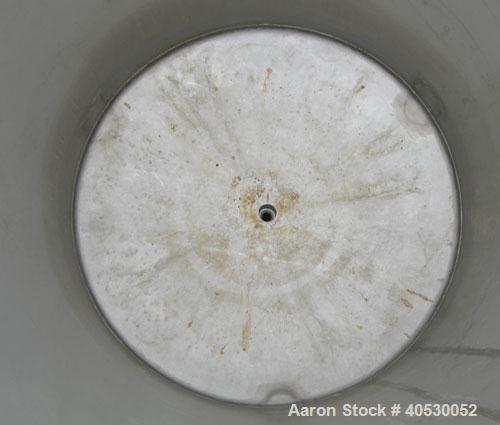 Used - Lee Metal Products Tank, Model 200DBT, 304 stainless steel, vertical. Approximately 40" diameter x 48" straight side, clamp down dished top, dish bottom. 1" center bottom outlet. Mounted on 3 ...