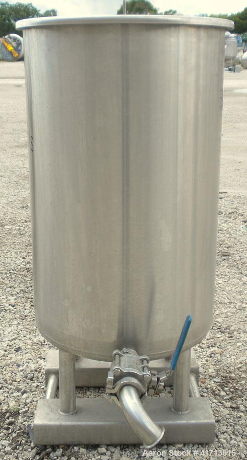 Used Lewis Process Systems Tank, 60 Gallon, 304 Stainless Steel, Vertical. 22" diameter x 36" straight side. Flat open top with removable cover, sloped bottom. 2" sanitary side bottom outlet. Mounted...