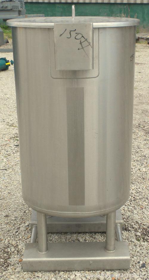 Used Lewis Process Systems Tank, 60 Gallon, 304 Stainless Steel, Vertical. 22" diameter x 36" straight side. Flat open top with removable cover, sloped bottom. 2" sanitary side bottom outlet. Mounted...
