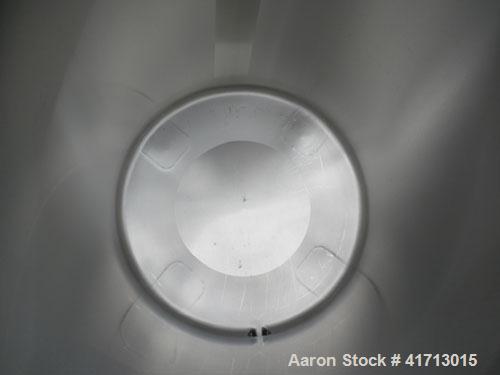 Used Lewis Process Systems Tank, 60 Gallon, 304 Stainless Steel, Vertical. 22" diameter x 36" straight side. Flat open top with removable cover, sloped bottom. 2" sanitary side bottom outlet. Mounted...
