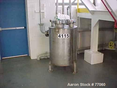 USED:Metro tank, 110 gallon, stainless steel, vertical. 29-1/2"diameter x 38" straight side. Flat top and bottom. Openings: top(1) 8", (3) 2", (2) 4"; side (1) 3", (2) 2"; 1" NPT off centerbottom out...