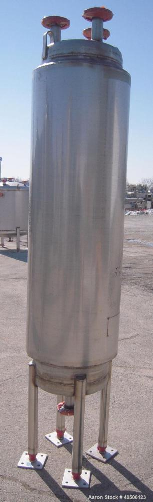 Unused- Mueller Pressure Tank, 50 Gallon, Model "F", 304L stainless steel, vertical. 17 1/2" diameter, 68" straight side, dished top and bottom. Internal rated 30 psi at 250 deg F and -20 deg F at 30...