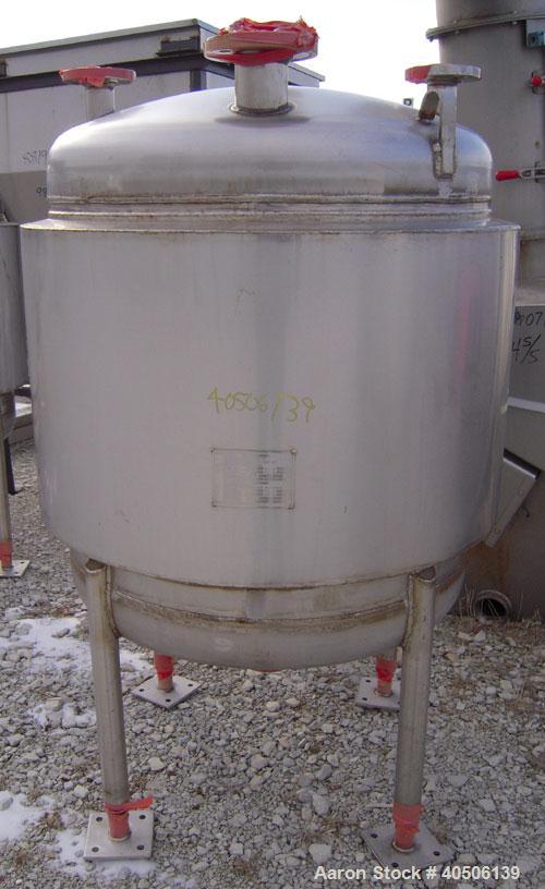 Unused- Mueller Pressure Tank, 100 Gallon, Model "F", 304L Stainless steel, Vertical. 36" diameter 30" straight side, dished top and bottom. Internal rated 30 psi at 300 deg.f., and -20 deg.f. at 30 ...
