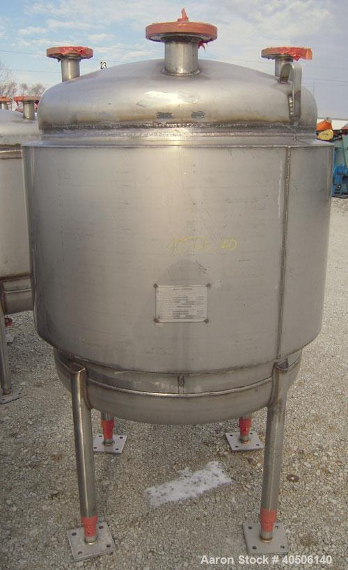 Unused- Mueller Pressure Tank, 100 Gallon, Model "F", 304L Stainless steel, Vertical. 36" diameter 30" straight side, dished top and bottom. Internal rated 30 psi at 300 deg.f., and -20 deg.f. at 30 ...