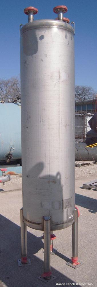 Unused- Mueller Pressure Tank, 150 Gallon, Model "F", 304L Stainless steel, Vertical. 23 1/2" diameter x 80" straight side, dished top and bottom. Internal rated 20 psi at 150 deg.f., and -20 deg.f. ...
