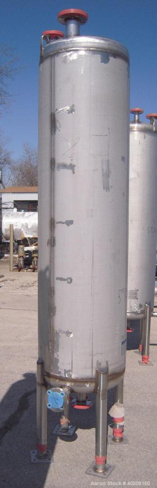 Unused- Mueller Pressure Tank, 150 Gallon, Model "F", 304L stainless steel, vertical. 23 1/2" diameter x 80" straight side, dished top and bottom. Internal rated 20 psi at 150 deg F, and -20 deg F at...