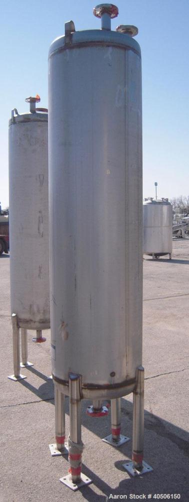 Unused- Mueller Pressure Tank, 150 Gallon, Model "F", 304L stainless steel, vertical. 23 1/2" diameter x 80" straight side, dished top and bottom. Internal rated 20 psi at 150 deg F, and -20 deg F at...